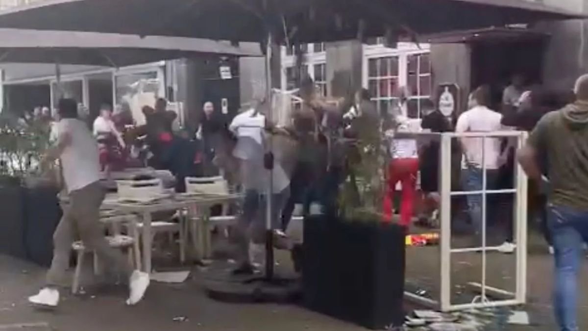 WATCH: Fans Throw Tables And Chairs In Massive Brawl Ahead Of Serbia Vs England Match
